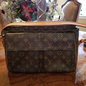 Authentic Louis Vuitton Cite Shoulder Handbag